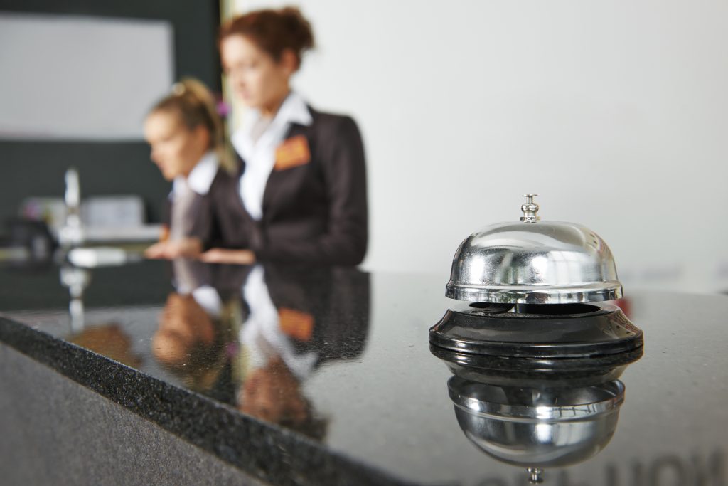 Modern,Luxury,Hotel,Reception,Counter,Desk,With,Bell
